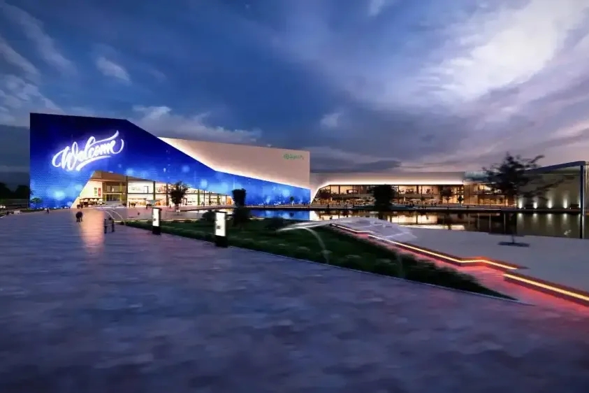 Animación para concurso: edificio iluminado de noche junto al agua