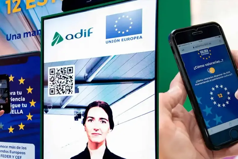 Quiz interactivo de MITMA: pantalla con QR y móvil del visitante sumando estrellas