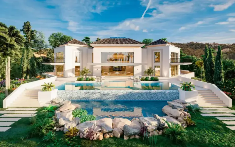 Villa en La Zagaleta (Benahavís): fachada blanca con piscina de roca y jardín tropical